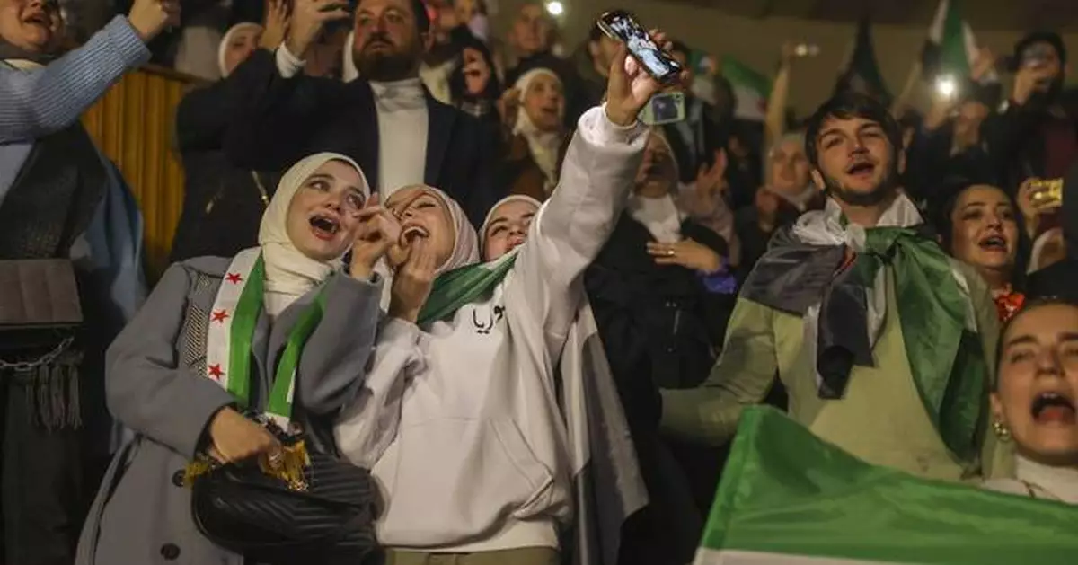 Syrians celebrate a month since Assad’s overthrow with revolutionary songs in Damascus