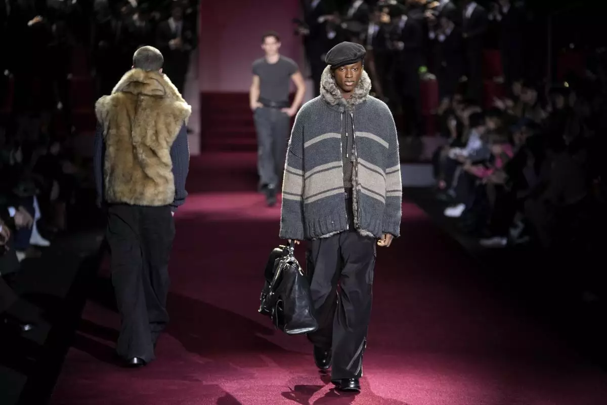 A model wears a creation part of the men's Dolce &amp; Gabbana Fall-Winter 2025-2026 collection, that was presented in Milan, Italy, Saturday, Jan. 18, 2025. (AP Photo/Luca Bruno)