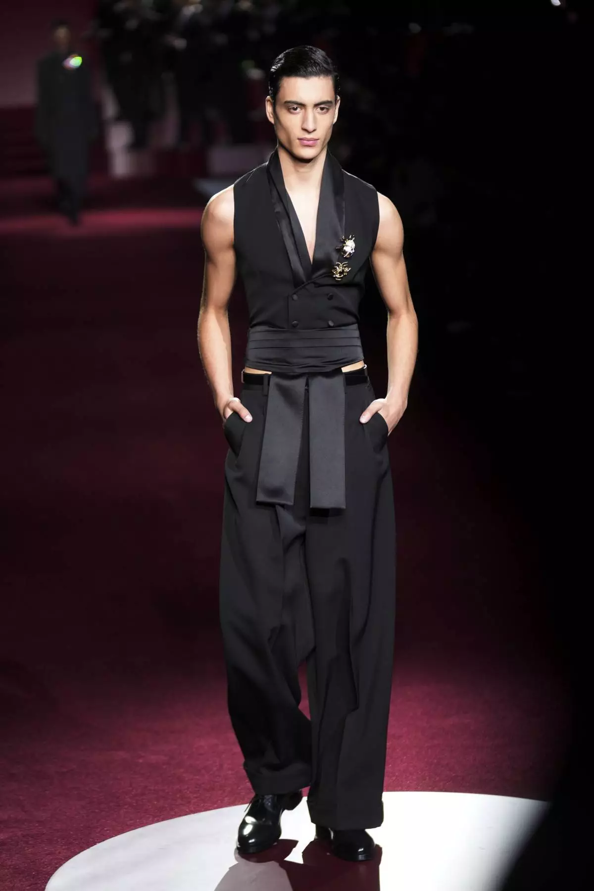 A model wears a creation part of the men's Dolce &amp; Gabbana Fall-Winter 2025-2026 collection, that was presented in Milan, Italy, Saturday, Jan. 18, 2025. (AP Photo/Luca Bruno)