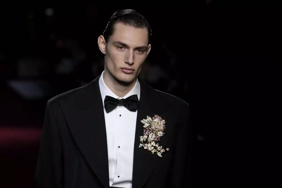 A model wears a creation part of the men's Dolce &amp; Gabbana Fall-Winter 2025-2026 collection, that was presented in Milan, Italy, Saturday, Jan. 18, 2025. (AP Photo/Luca Bruno)