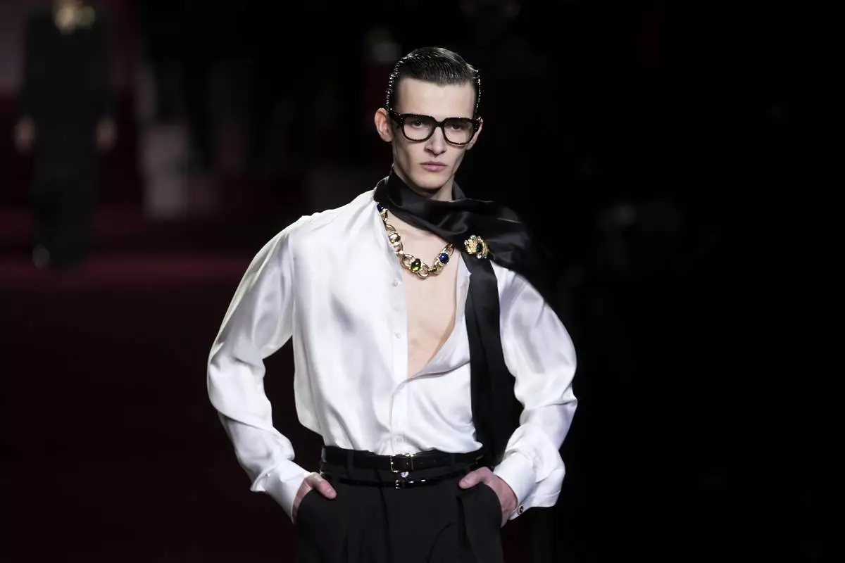 A model wears a creation part of the men's Dolce &amp; Gabbana Fall-Winter 2025-2026 collection, that was presented in Milan, Italy, Saturday, Jan. 18, 2025. (AP Photo/Luca Bruno)