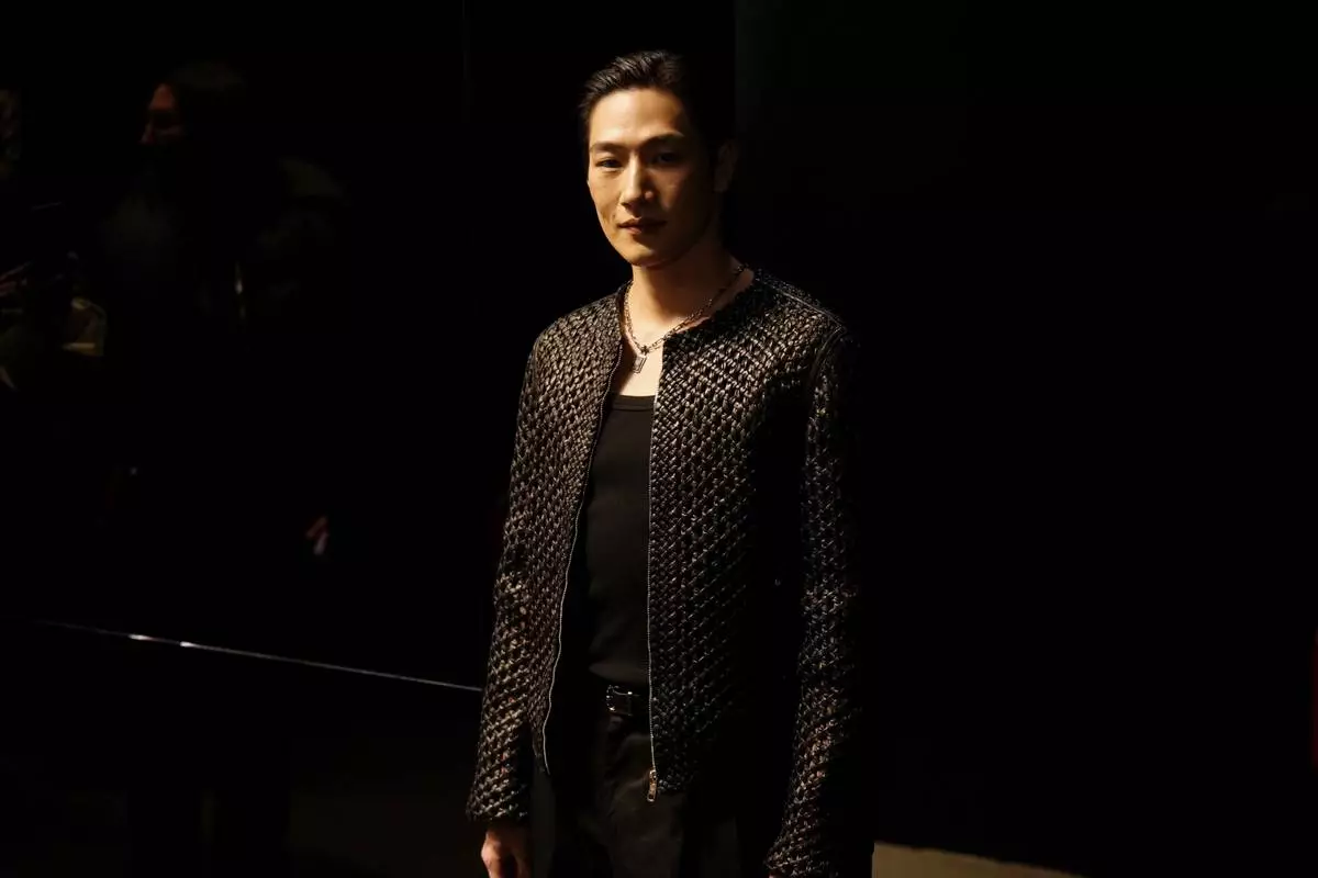 Steve Sang-Hyun Noh attends the men's Dolce &amp; Gabbana Fall-Winter 2025-2026 collection show, that was presented in Milan, Italy, Saturday, Jan. 18, 2025. (AP Photo/Luca Bruno)