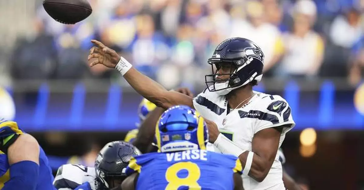 Geno Smith throws career-high 4 TD passes in Seahawks' 30-25 win over playoff-bound Rams