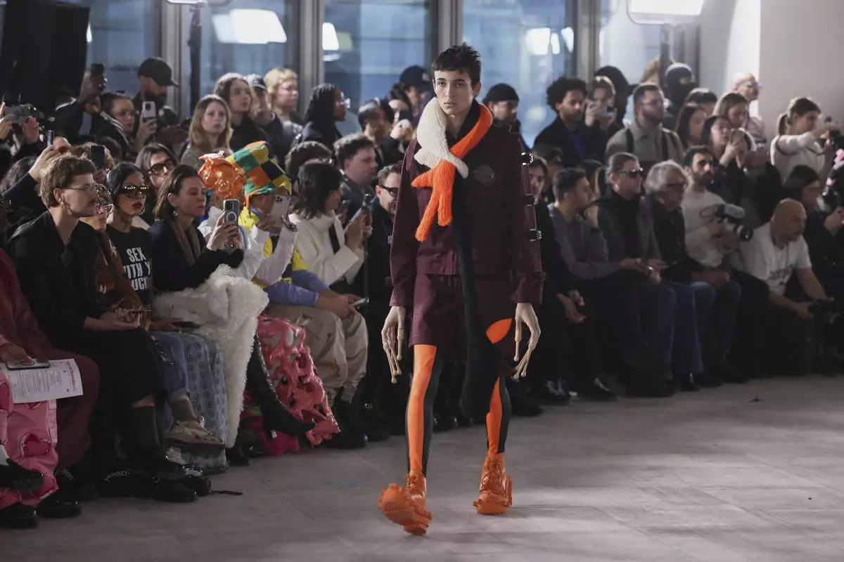 A model wears a creation as part of the men's Walter van Beirendonck Fall-Winter 2025-2026 collection, that was presented in Paris, Wednesday, Jan. 22, 2025. (AP Photo/Thomas Padilla).