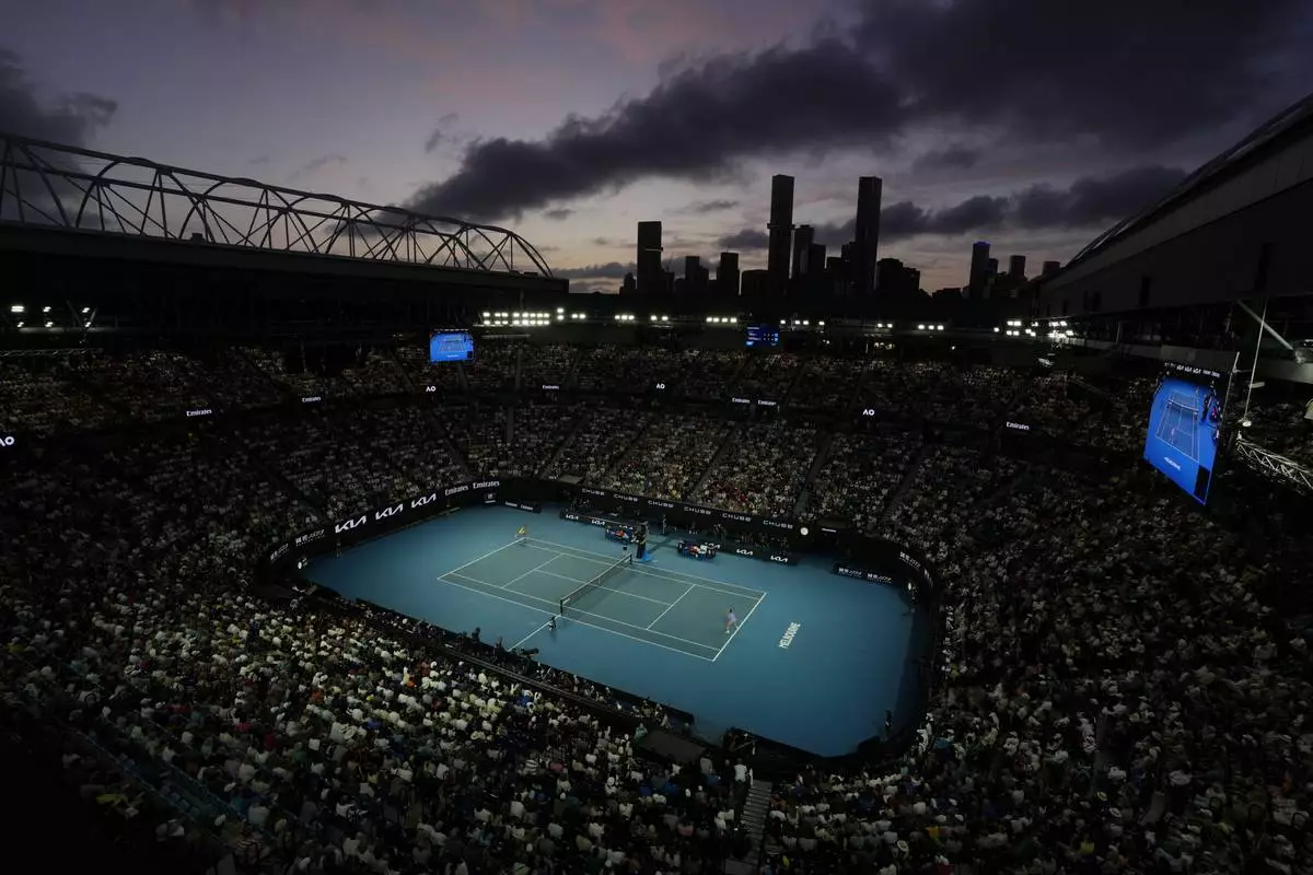 Aryna Sabalenka of Belarus and Anastasia Pavlyuchenkova of Russia play their quarterfinal match on Rod Laver Arena at the Australian Open tennis championship in Melbourne, Australia, Tuesday, Jan. 21, 2025. (AP Photo/Vincent Thian)