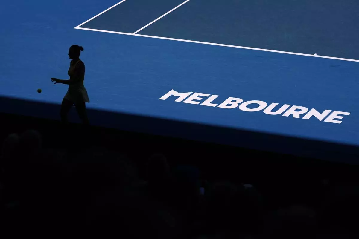Aryna Sabalenka of Belarus prepares to serve to Clara Tauson of Denmark during their third round match at the Australian Open tennis championship in Melbourne, Australia, Friday, Jan. 17, 2025. (AP Photo/Asanka Brendon Ratnayake)