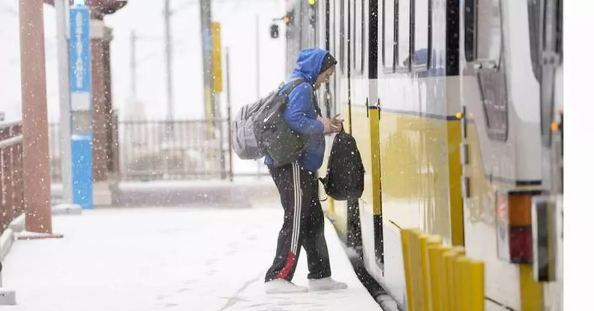 Winter storm plods into the Deep South, prompting states of emergency and school closures