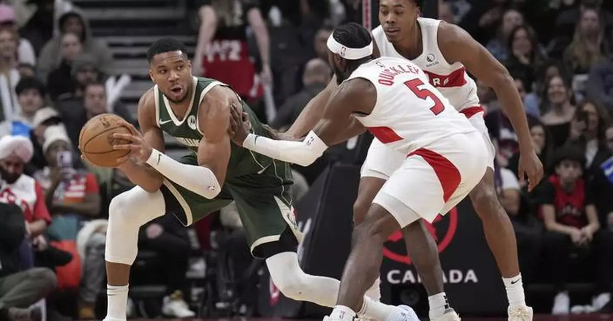 Antetokounmpo's triple-double, Lillard's 25 points power Bucks past struggling Raptors 128-104