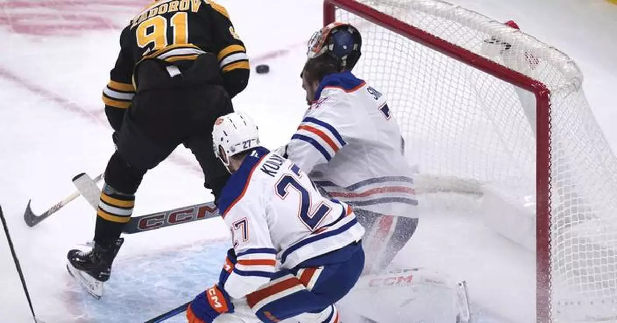 Oilers' goalie Stuart Skinner leaves game briefly after collision with Bruins' Nikita Zadorov