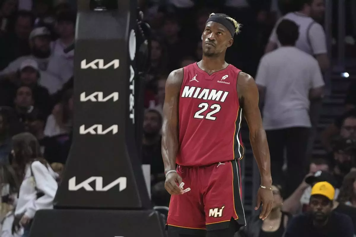 FILE - Miami Heat forward Jimmy Butler (22) stands on the court during the second half of an NBA basketball game against the Portland Trail Blazers, Tuesday, Jan. 21, 2025, in Miami. (AP Photo/Lynne Sladky, File)