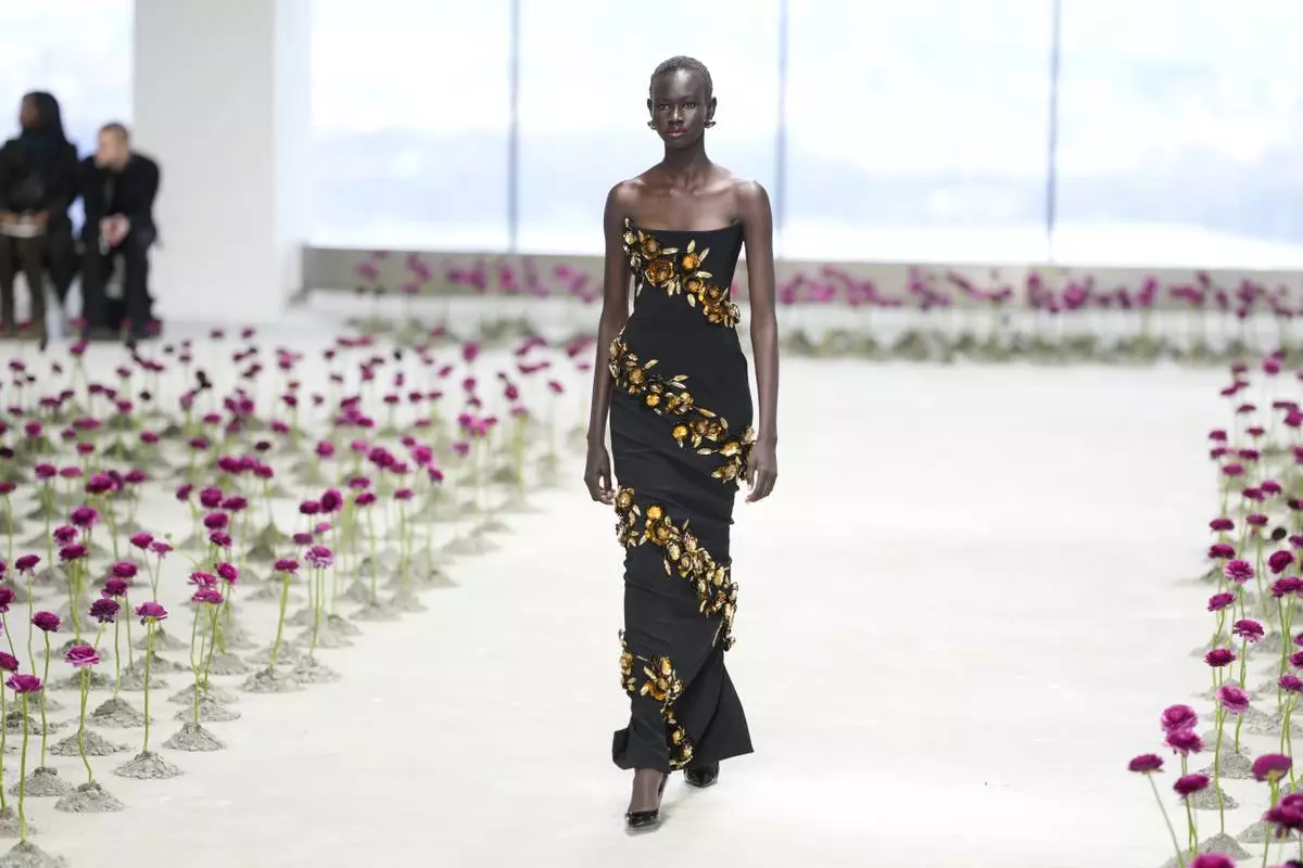 A model walks the runway during the Carolina Herrera Fall/Winter 2025 fashion show as part of New York Fashion Week on Monday, Feb. 10, 2025, in New York. (Photo by Charles Sykes/Invision/AP)
