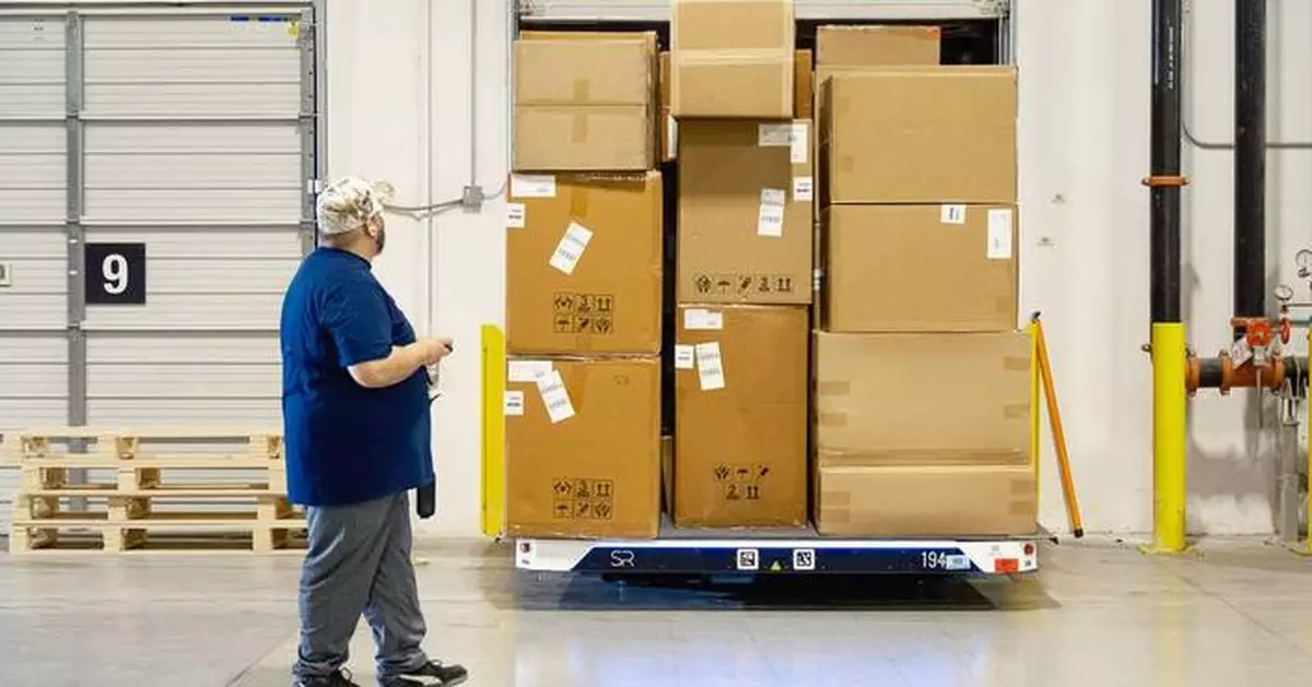 Four Hands Increases Truck Loading/Unloading Speed with Slip Robotics
