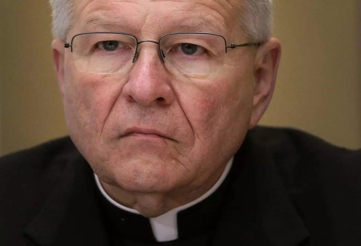 File -New Orleans Gregory Aimond, the bishop of New Orleans, listens to questions at a press conference at the Catholic Bachelor of the Catholic Council on Tuesday, November 12, 2013.