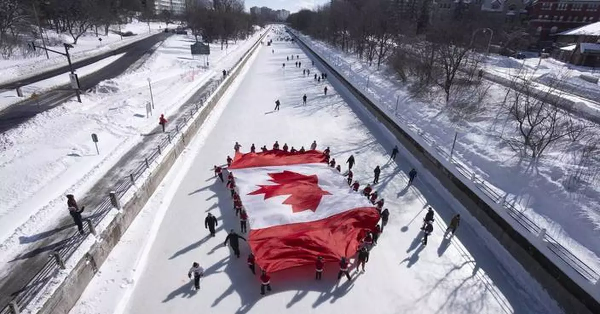 Defiant Canadians mark their flag's anniversary as Trump hopes to make their country a state