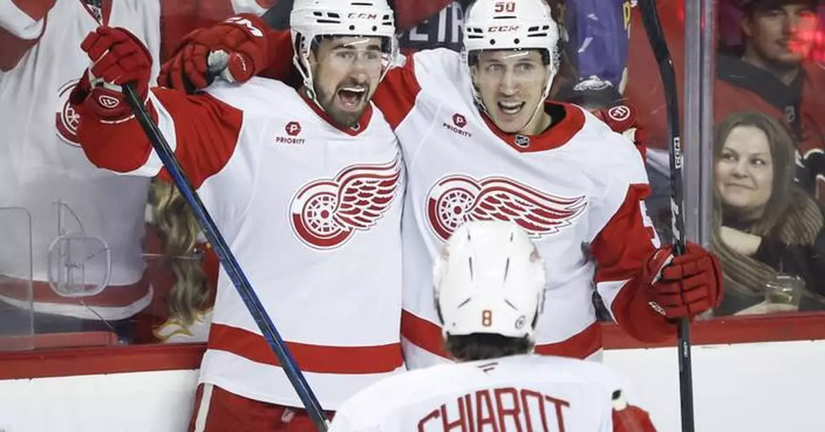 Talbot and Larkin lead Red Wings past Flames 3-1 for 5th straight win