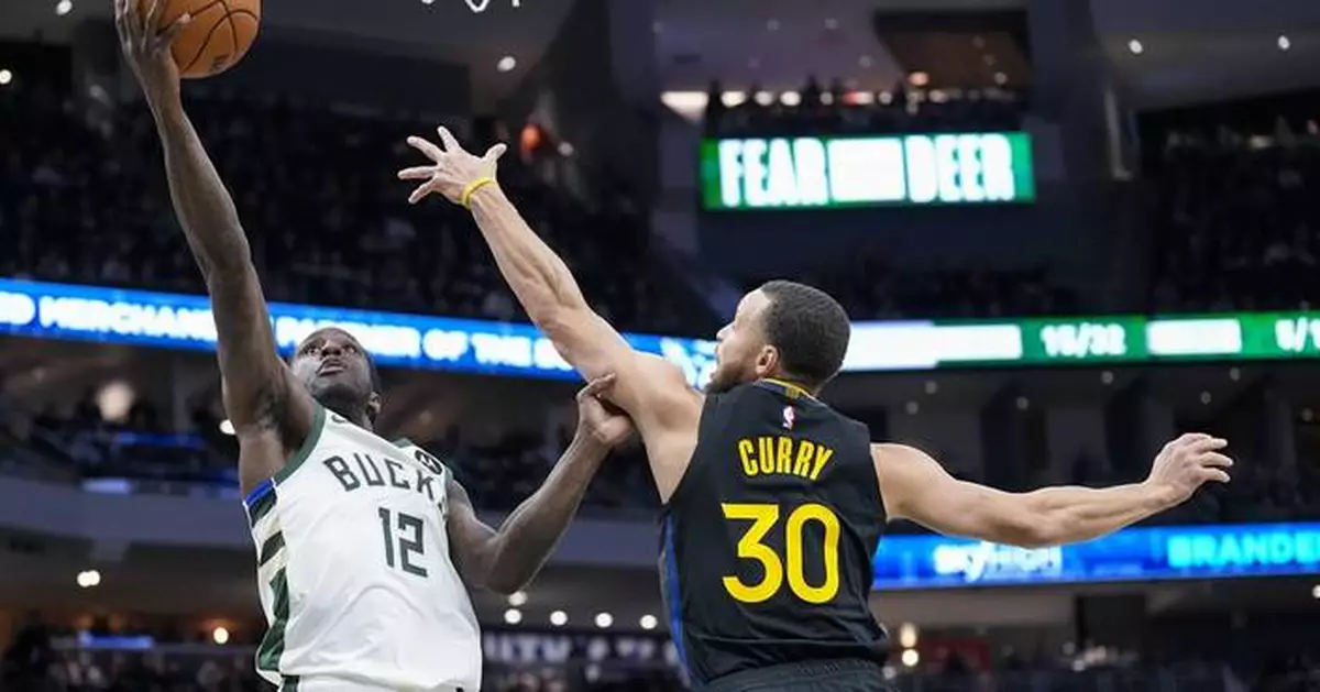 Curry scores 38 points as Warriors win 125-111 at Milwaukee