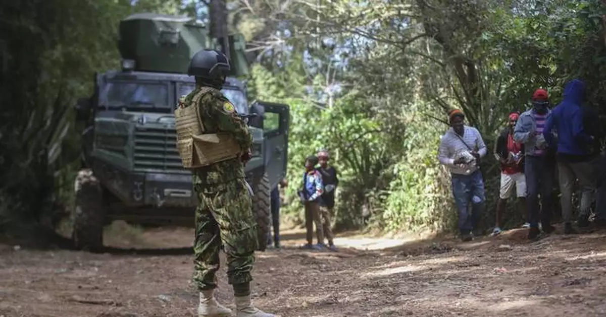 Kenyan police officer sent to Haiti to help rein in violent gangs is killed in fighting