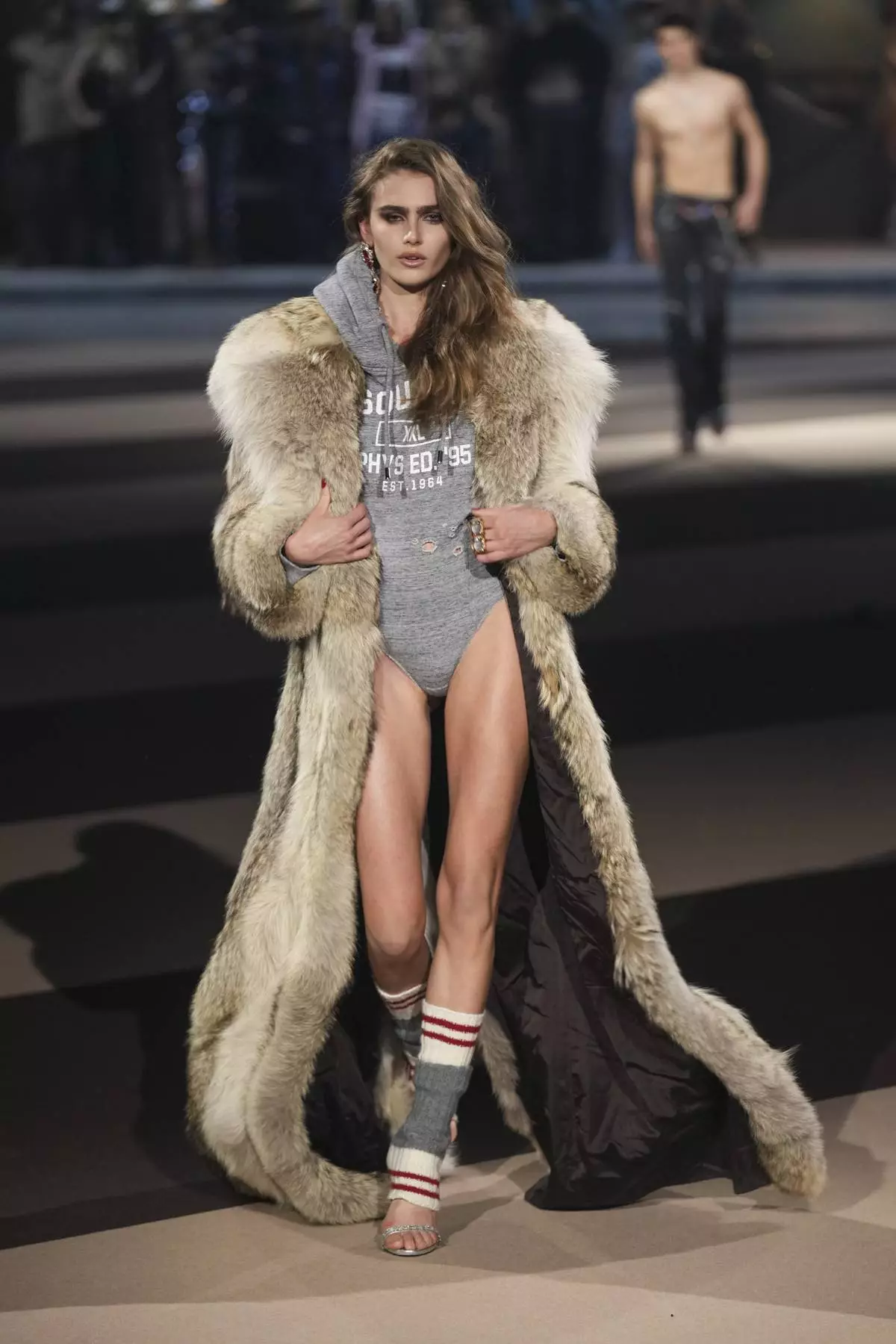 A model wears a creation as part of the Dsquared2 Fall/Winter 2025-2026 men's and women's collection presented in Milan, Italy, Tuesday, Feb. 25, 2025. (AP Photo/Antonio Calanni)
