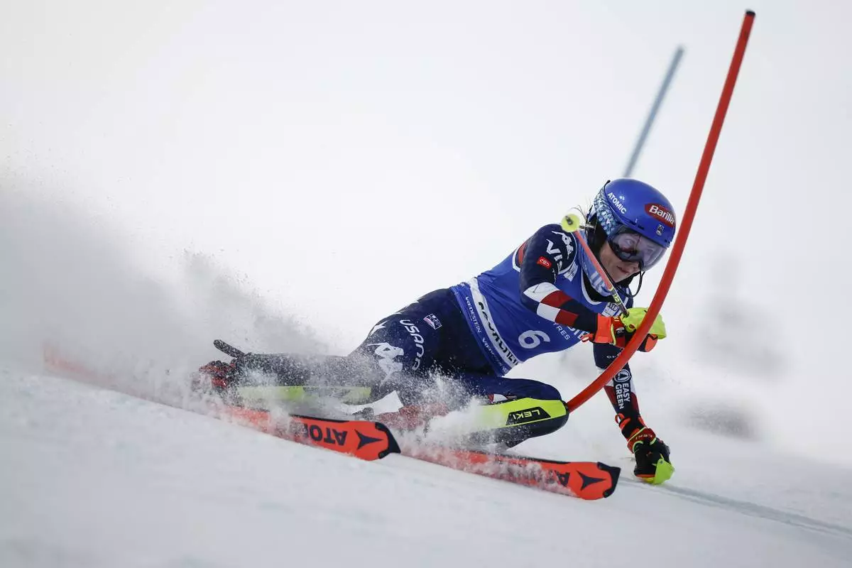 United States' Mikaela Shiffrin speeds down the course during the first run of a women's World Cup slalom, in Courchevel, France, Thursday Jan. 30, 2025. (AP Photo/Gabriele Facciotti)