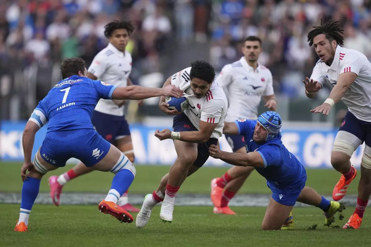 France's Louis Bielle-Biarrey in action, during the Six Nations rugby union match between Italy and France at the Olympic stadium, in Rome, Sunday, Feb. 23, 2025. (Alfredo Falcone/LaPresse via AP)