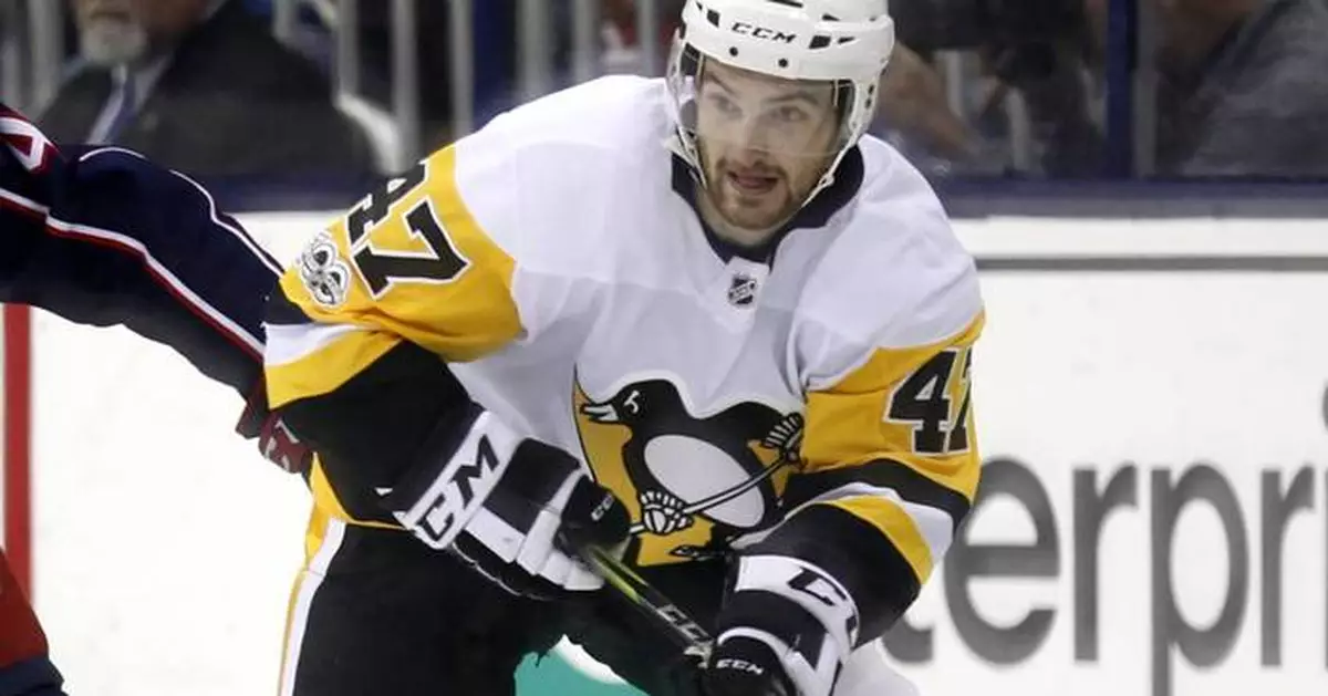 Man re-bailed in investigation of death of hockey player Adam Johnson