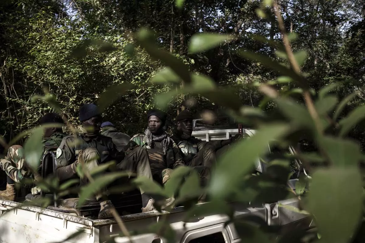 Members of the Lion Intervention Brigade conduct a patrol at Niokolo Koba National Park, Senegal on Tuesday, Jan. 14, 2025. (AP Photo/Annika Hammerschlag)