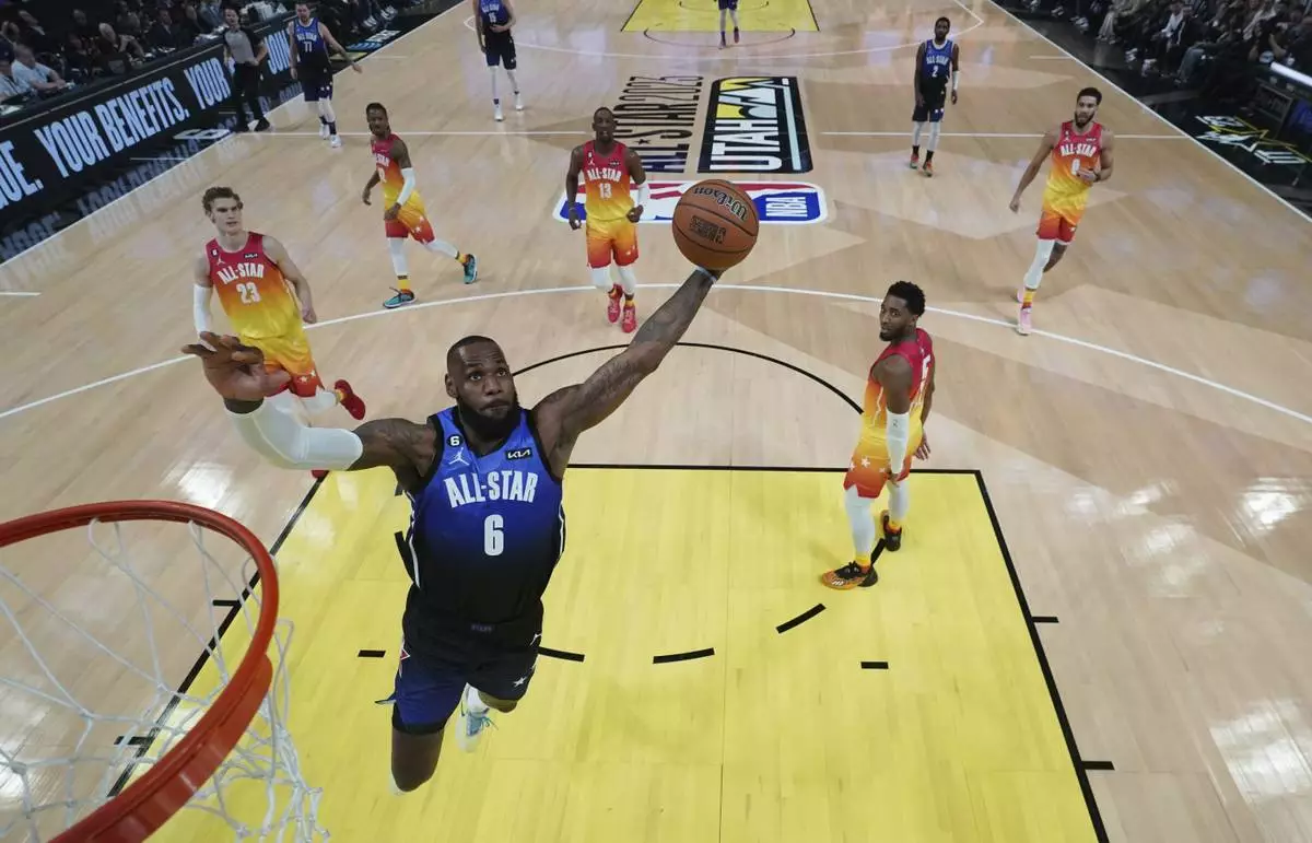 FILE - Team LeBron forward LeBron James (6) dunks during the first half of the NBA basketball All-Star game Sunday, Feb. 19, 2023, in Salt Lake City. (AP Photo/Kyle Terada/Pool Photo via AP, File)