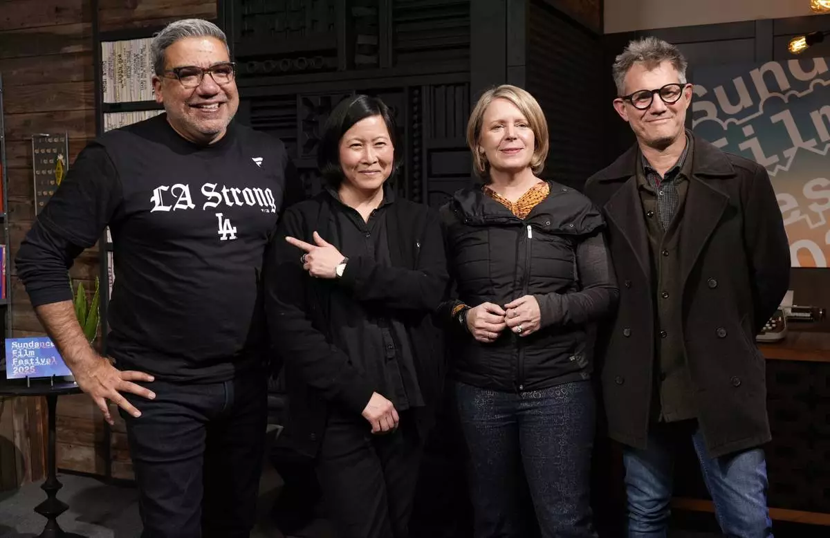 From left, Sundance Film Festival director Eugene Hernandez, director of programming Kim Yutani, Sundance Institute Acting CEO Amanda Kelso and senior festival programmer John Nein pose together at a news conference before the 2025 Sundance Film Festival on Wednesday, Jan. 22, 2025, in Park City, Utah. (AP Photo/Chris Pizzello)