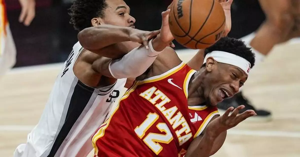 De'Andre Hunter traded by Atlanta to Cleveland for package of players and picks