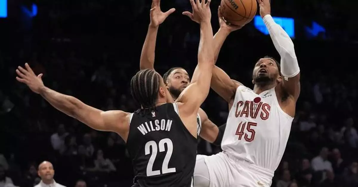 Donovan Mitchell scores 26 points as the Eastern Conference-leading Cavaliers beat the Nets 110-97