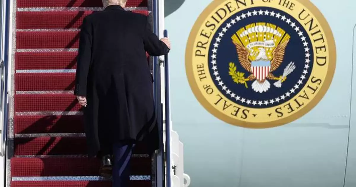 Trump tours Boeing plane to highlight aircraft maker's delay in delivering a new Air Force One