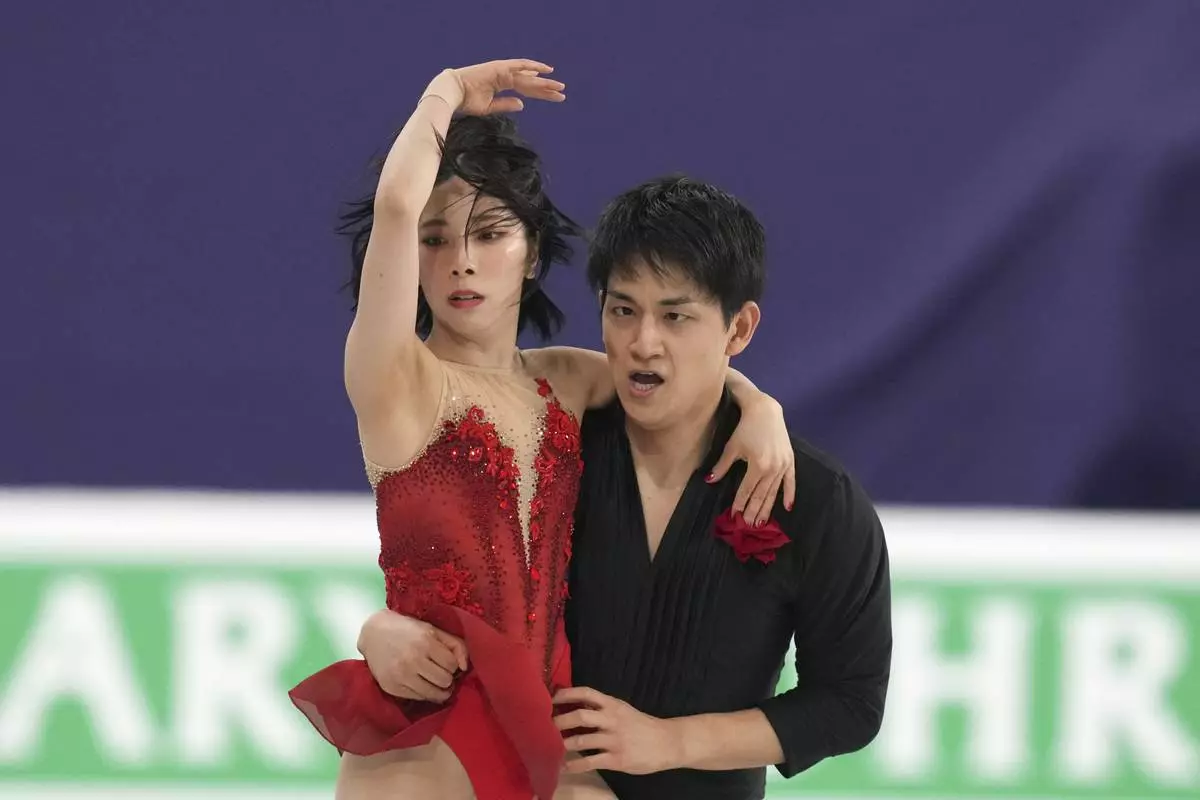 Riku Miura, left, and Ryuichi Kihara of Japan perform during the pairs free skating at the ISU Four Continents Figure Skating Championships at the Mokdong ice rink in Seoul, South Korea, Friday, Feb. 21, 2025. (AP Photo/Lee Jin-man)