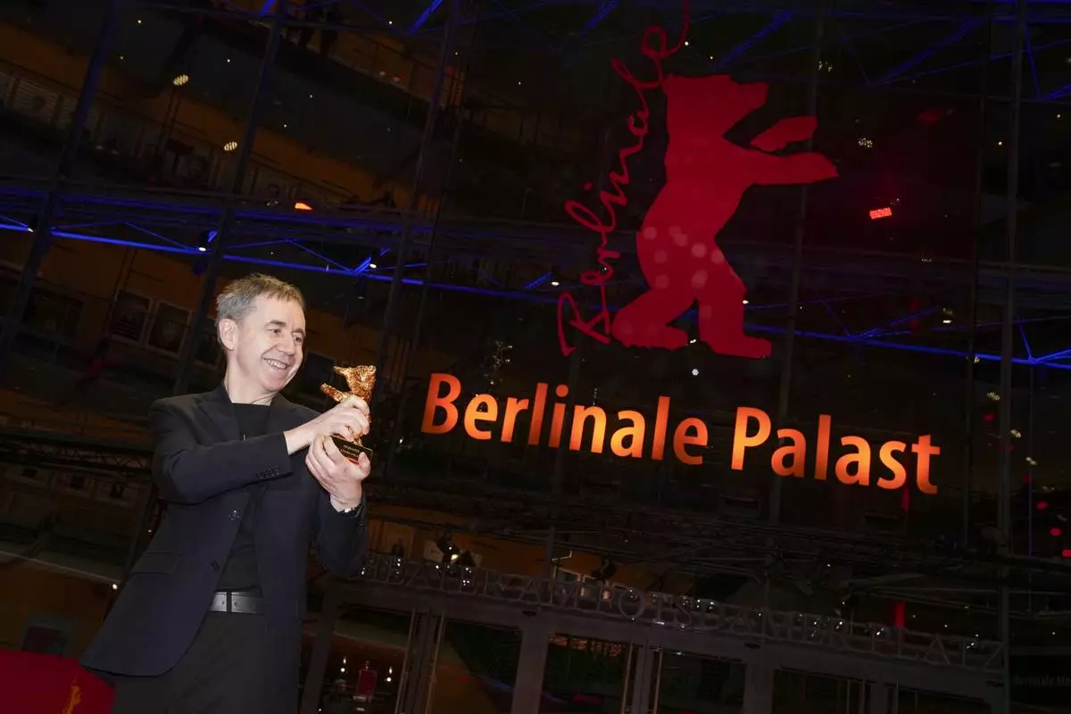 Dag Johan Haugerud, winner of the Golden Bear for best film for 'Dreams (Sex Love)', poses for photographers at the winners photo call during the International Film Festival, Berlinale, in Berlin, Saturday, Feb. 22, 2025. (Photo by Scott A Garfitt/Invision/AP).