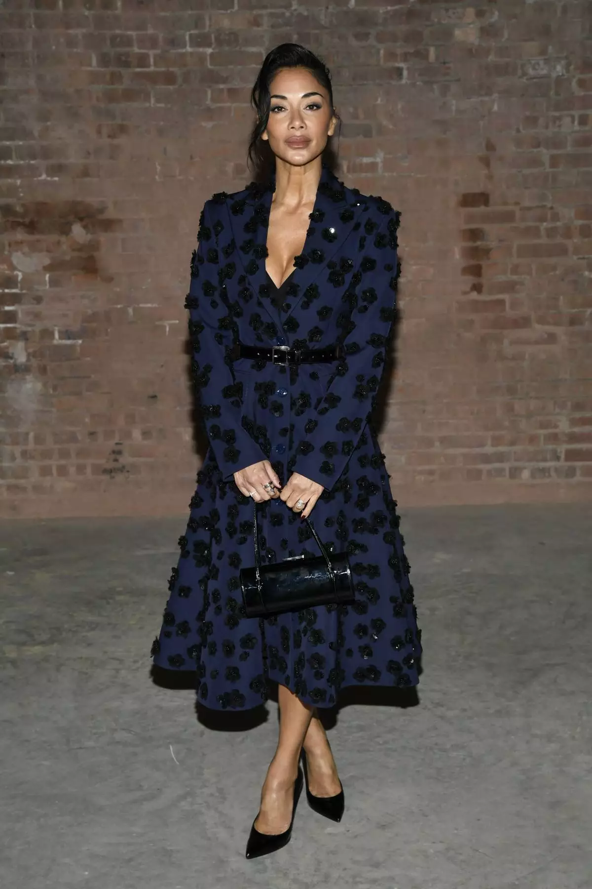 CORRECTS EVENT - Nicole Scherzinger attends the Michael Kors Fall/Winter 2025 fashion show as part of New York Fashion Week on Tuesday, Feb. 11, 2025, at Terminal Warehouse in New York. (Photo by Evan Agostini/Invision/AP)