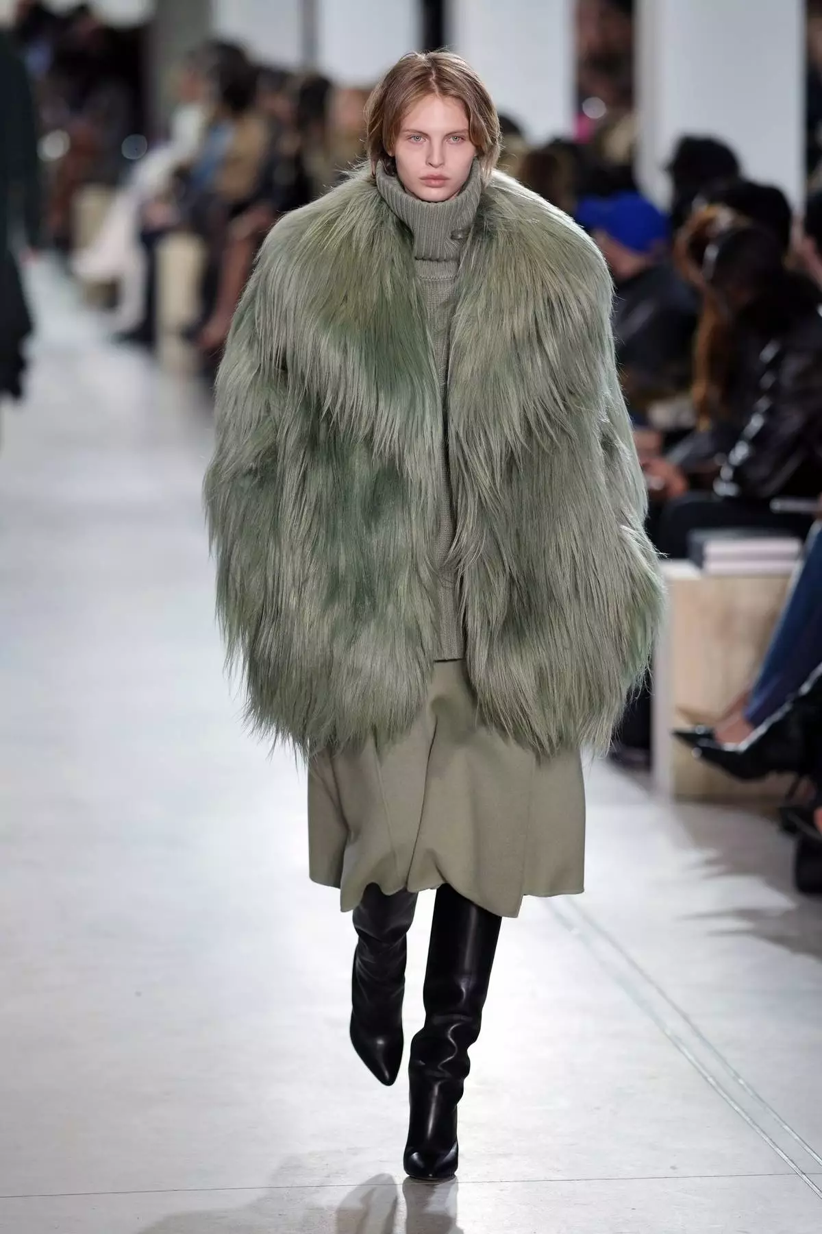 A model walks the runway during the Michael Kors Fall/Winter 2025 fashion show as part of New York Fashion Week on Tuesday, Feb. 11, 2025, at Terminal Warehouse in New York. (Photo by Charles Sykes/Invision/AP)