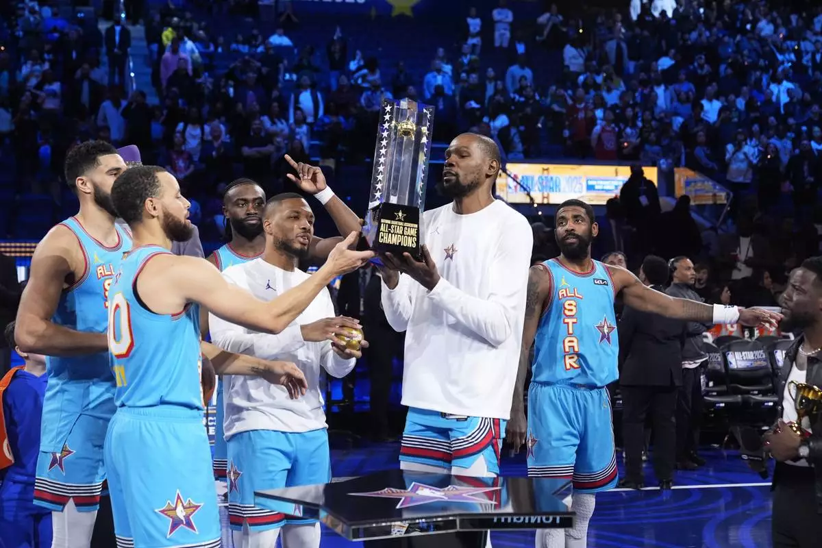 Members of Shaq's OGs celebrates after winning the NBA All-Star basketball game Sunday, Feb. 16, 2025, in San Francisco. (AP Photo/Godofredo A. Vásquez)