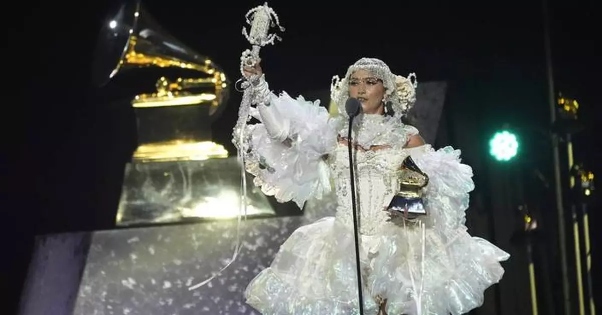 Sparkle and color pop amid more subdued tones on Grammys red carpet