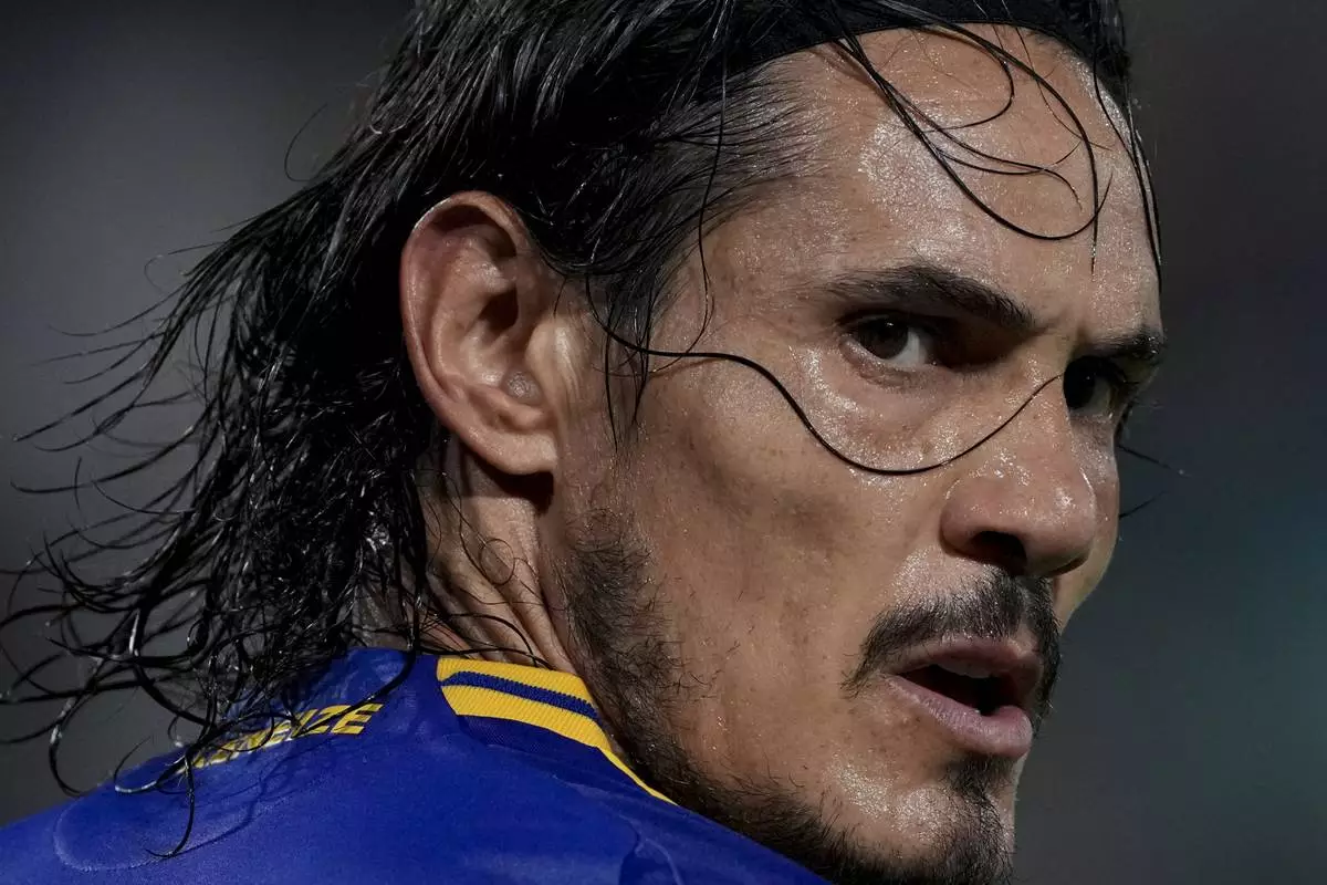 Edinson Cavani of Argentina's Boca Juniors reacts during a Copa Libertadores soccer match against Peru's Alianza Lima at La Bombonera stadium in Buenos Aires, Argentina, Tuesday, Feb. 25, 2025. (AP Photo/Gustavo Garello)