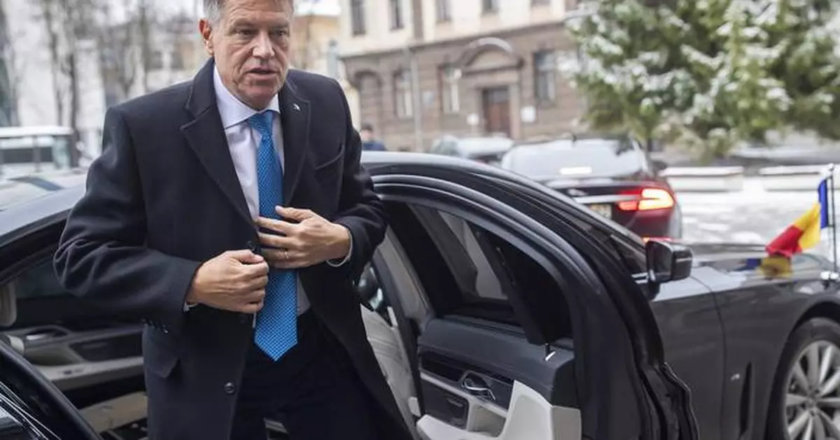 Romania's Iohannis steps down, leaving caretaker president in charge until election rerun in spring