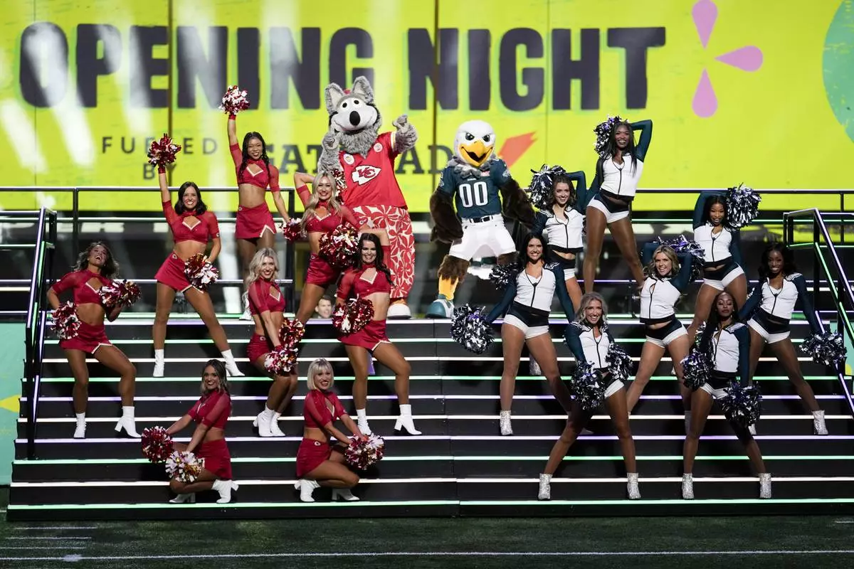 Cheerleaders perform during Super Bowl 59 Opening Night, Monday, Feb. 3, 2025, in New Orleans, ahead of the NFL football game between the Philadelphia Eagles and the Kansas City Chiefs Sunday. (AP Photo/Matt York)