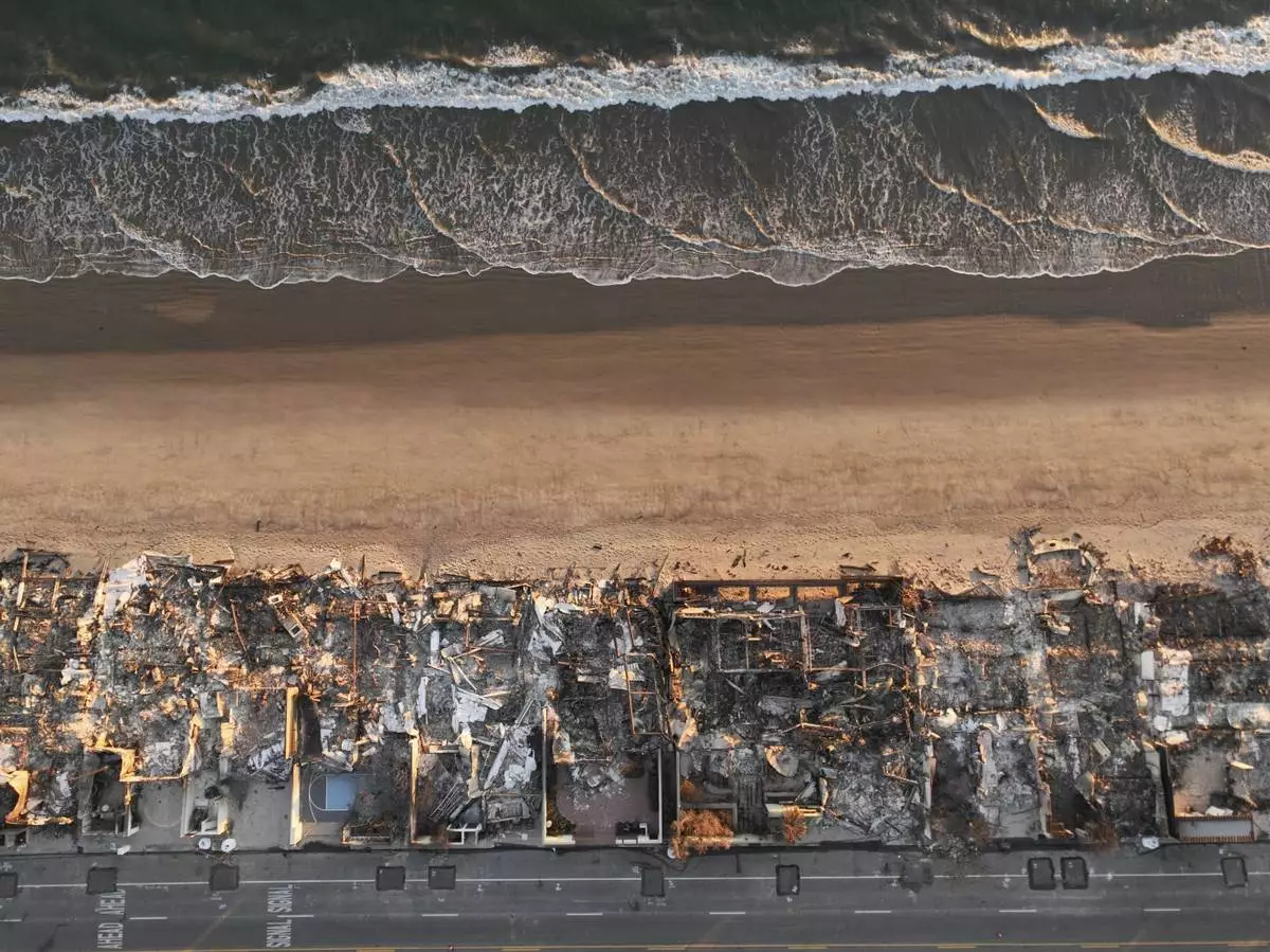 FILE - An aerial view shows the devastation by the Palisades Fire Thursday, Jan. 16, 2025 in Malibu, Calif. (AP Photo/Jae C. Hong, File)