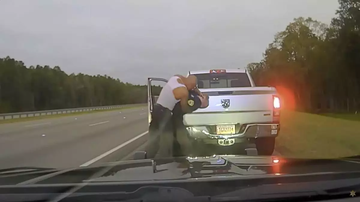FILE - This still image provided by Camden County Sheriff's Office shows the police dash camera video of a traffic stop involving a sheriff's deputy and Leonard Cure on Monday, Oct. 16, 2023, in Camden County, Ga. (Camden County Sheriff's Office via AP)