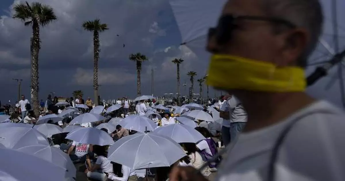 Gaza ceasefire sees its smoothest exchange yet of Israeli hostages for Palestinian prisoners