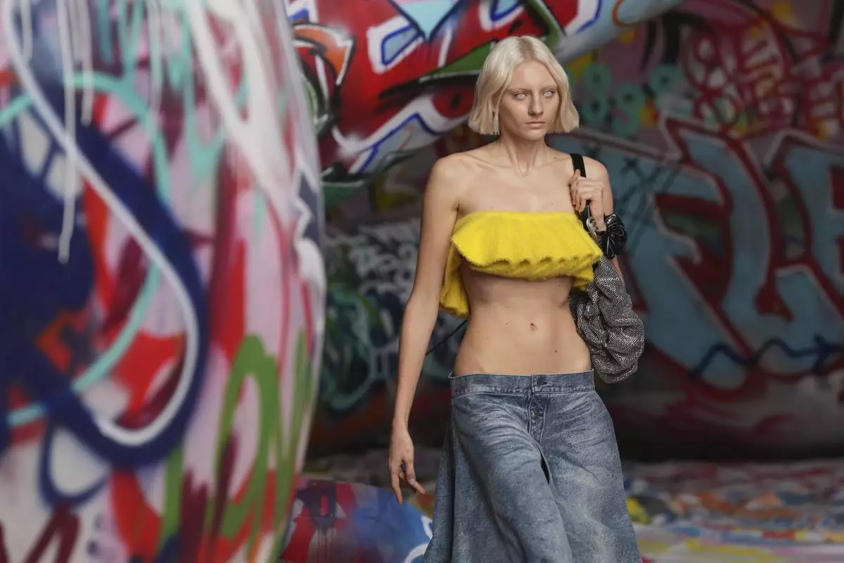 A model wears a creation of the Diesel Fall/Winter 2025-2026 women's collection presented in Milan, Italy, Wednesday, Feb. 26, 2025. (AP Photo/Antonio Calanni)