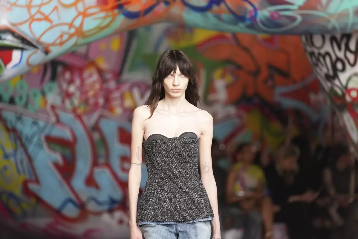 A model wears a creation of the Diesel Fall/Winter 2025-2026 women's collection presented in Milan, Italy, Wednesday, Feb. 26, 2025. (AP Photo/Antonio Calanni)