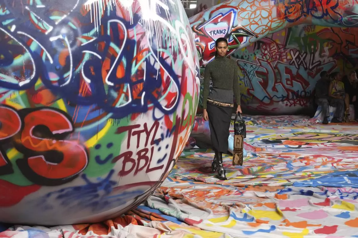 A model wears a creation of the Diesel Fall/Winter 2025-2026 women's collection presented in Milan, Italy, Wednesday, Feb. 26, 2025. (AP Photo/Antonio Calanni)