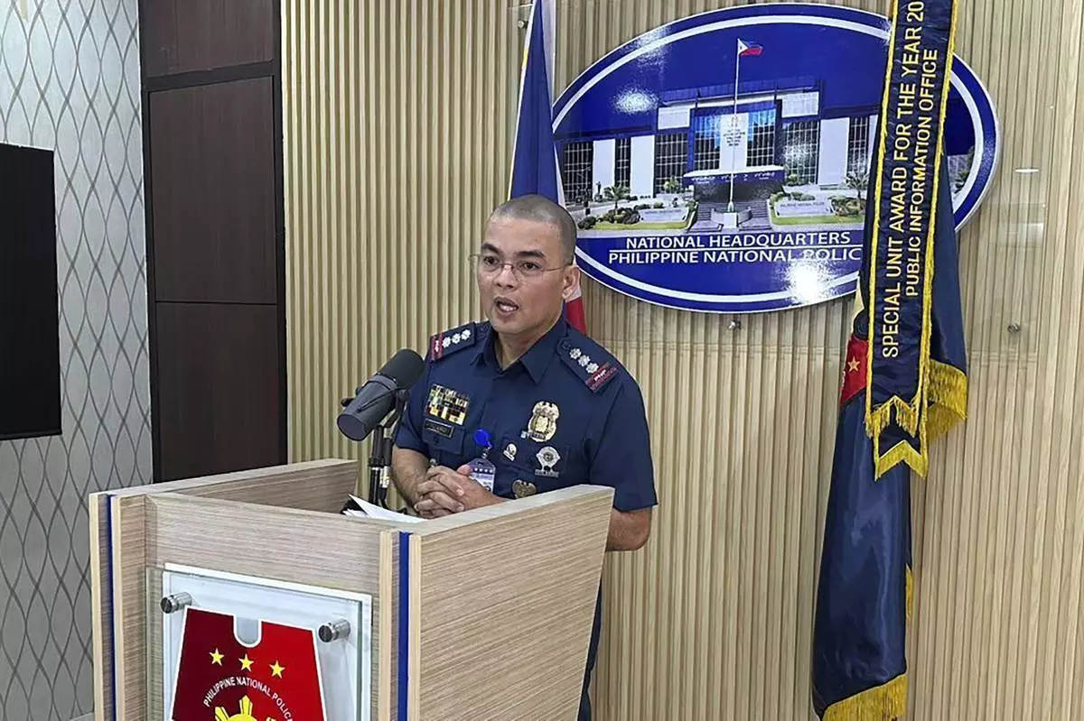 Philippines Police Col. Randulf Tuaño, chief public information office, speaks during a press conference at the Philippine National Police headquarters in Manila Friday, Jan. 31, 2025 as he confirmed that a Philippine police official was one of the passengers killed onboard the American Airlines plane that collided with an Army Blackhawk helicopter in the United States. (AP Photo/Joeal Calupitan)