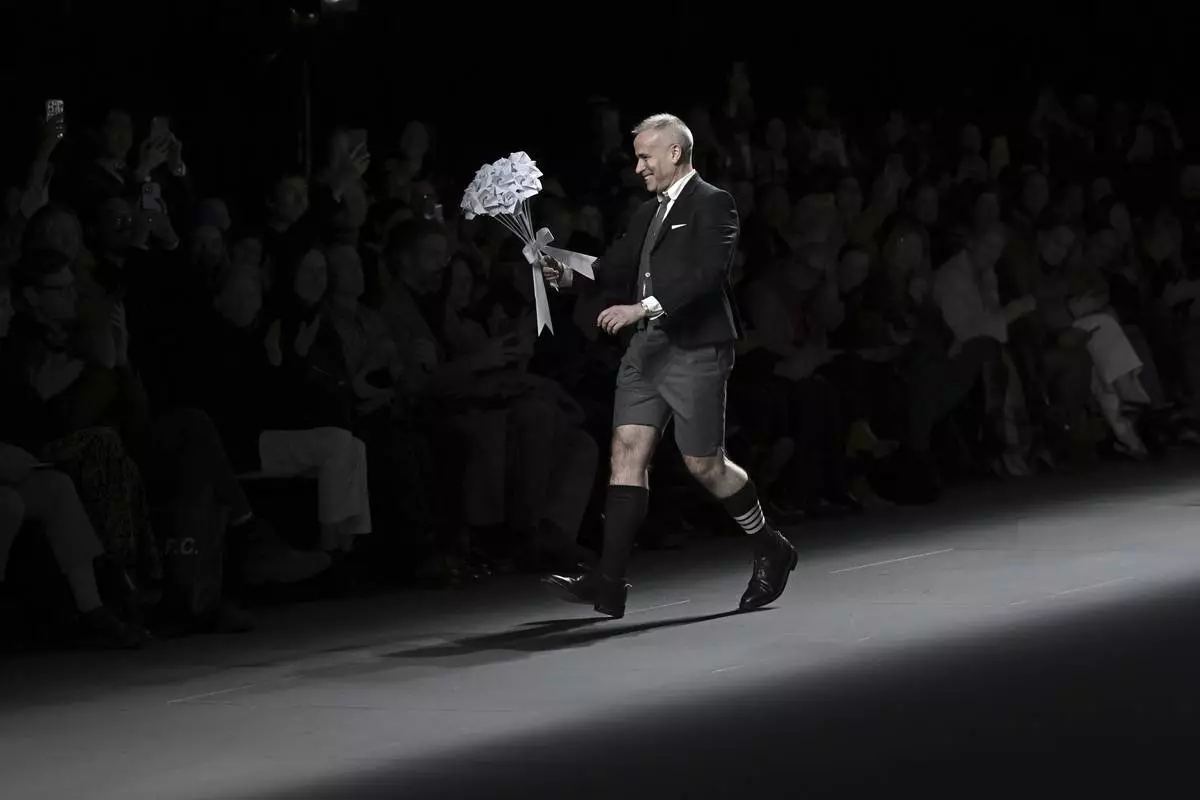 Designer Thom Browne accepts applause after the Thom Browne Fall/Winter 2025 fashion show as part of New York Fashion Week on Tuesday, Feb. 11, 2025, at The Shed in New York. (Photo by Evan Agostini/Invision/AP)