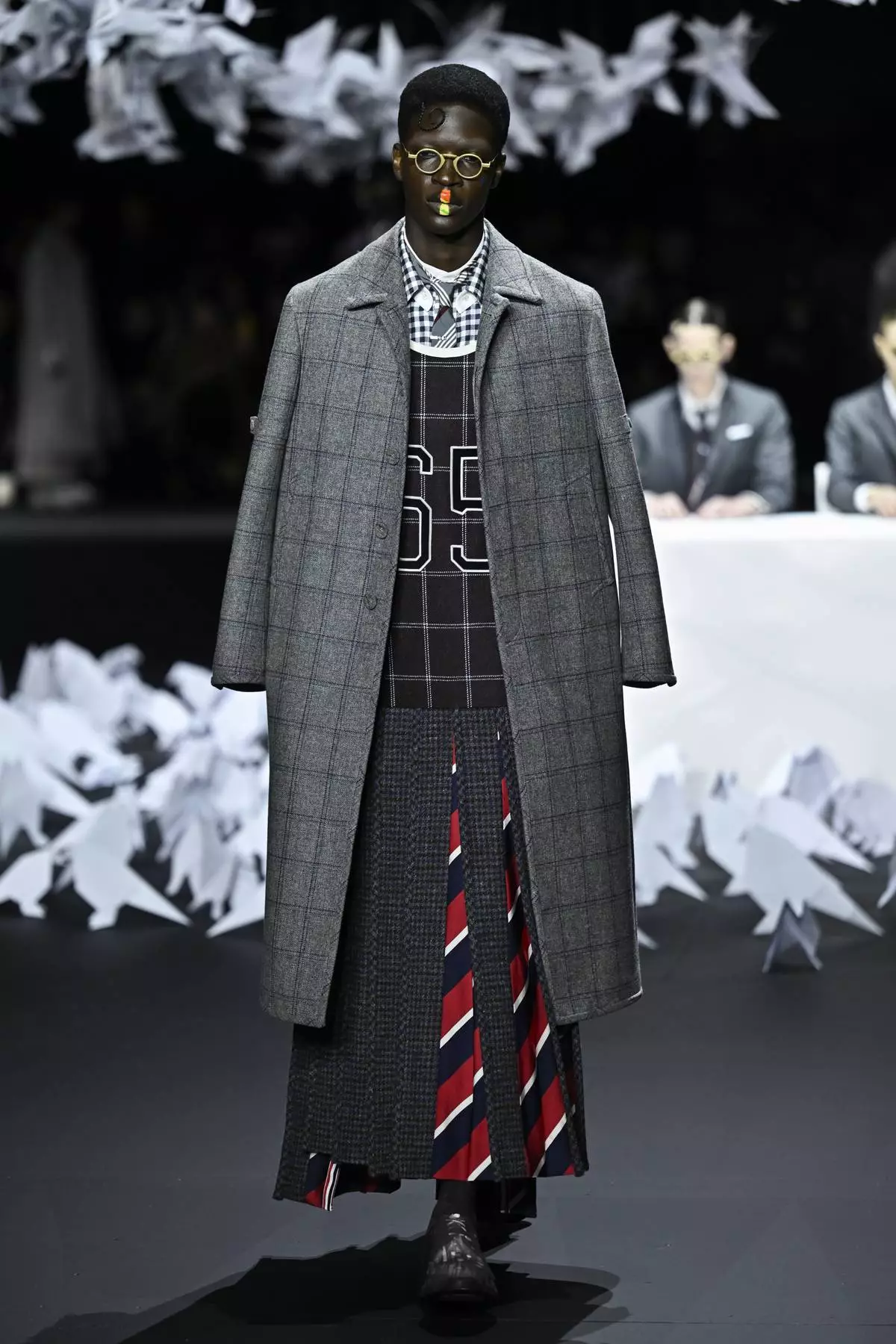 A model walks the runway during the Thom Browne Fall/Winter 2025 fashion show as part of New York Fashion Week on Tuesday, Feb. 11, 2025, at The Shed in New York. (Photo by Evan Agostini/Invision/AP)
