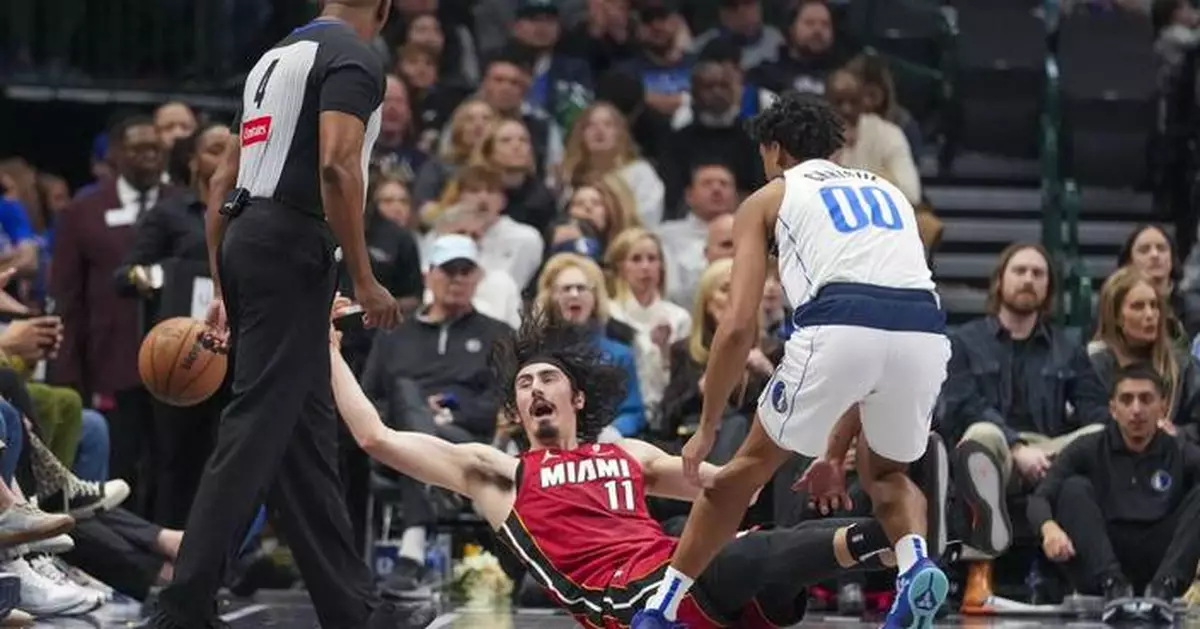Dante Exum scores 27 points to lead undermanned, undersized Mavericks past Heat, 118-113